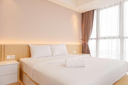 Pantai Indah Kapuk Apartamento | Modern Look and Nice 2BR Gold Coast Apartment near PIK By Travelio