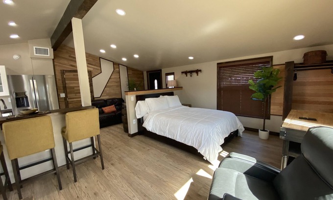 Cocoa Casa | Modern Ranch Studio With a Beautiful Round Porch