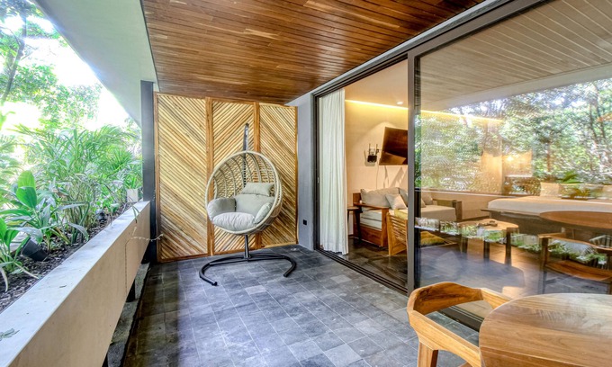 Zama Apartamento | Modern second floor studio with pool, partial AC, and balcony