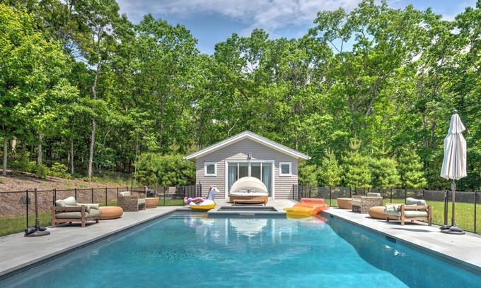 Amagansett North Casa | Modern-style home with heated private pool, open-floor plan, ample natural...