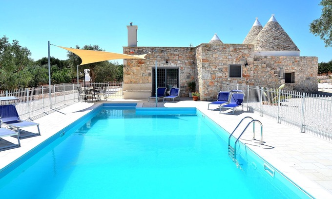 Castellana Grotte Villa | Modern trulli, 3 bedrooms, air conditioning, private swimming pool, pétanque court.