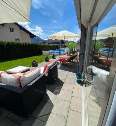 Adnet Apartamento | Modernes Alpenapartment mit Sauna Wintergarten und Pool