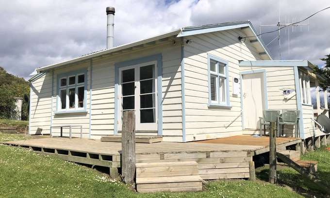 Moeraki Casa | Moeraki Cottage con vistas al océano en el pueblo de Moeraki