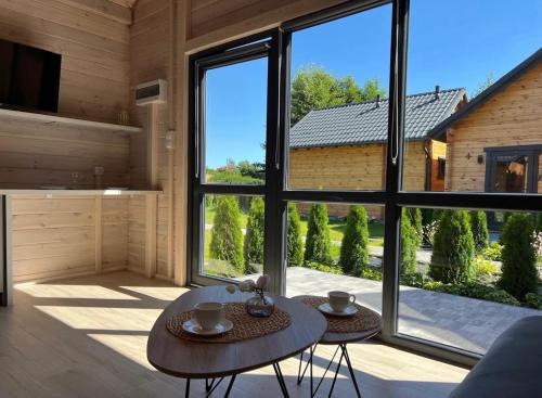 Debina Casa | MOJA DEBINA LUX 1, domek z pokojem dziennym, jedną sypialnią i antresolą, blisko plaży