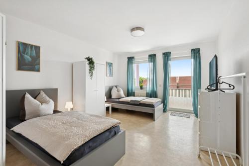 Woerrstadt Apartamento | Monteurswohnung Wörrstadt mit Balkon
