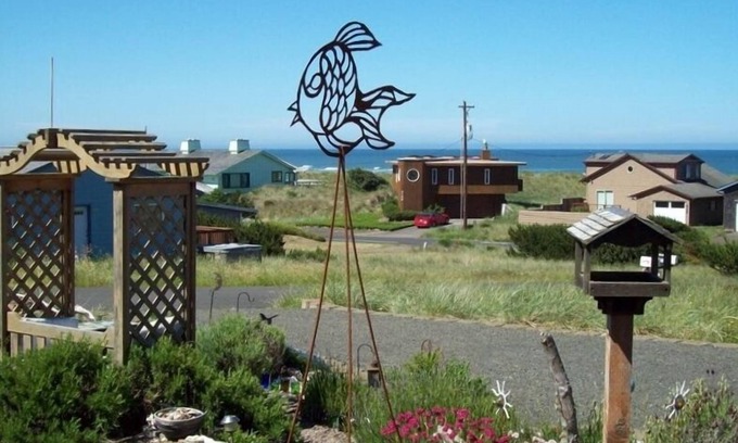 Bayshore Casa | Moonstruck Mermaid Fenced Yard Se aceptan mascotas Vista al mar Bañera de hidromasaje Wifi Prem Cable