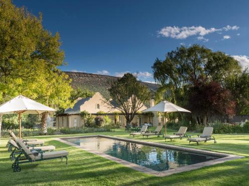 Blue Crane Route Cabina | Mount Camdeboo Private Game Reserve by NEWMARK
