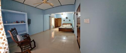 Nallur Cama Y Desayuno | Nalluran illam - family room