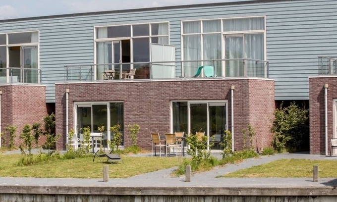 Oude-Tonge Casa | Casa de la isla limpia con hermosa vista, para grupos más grandes, es ideal para alquilar en combinación con th