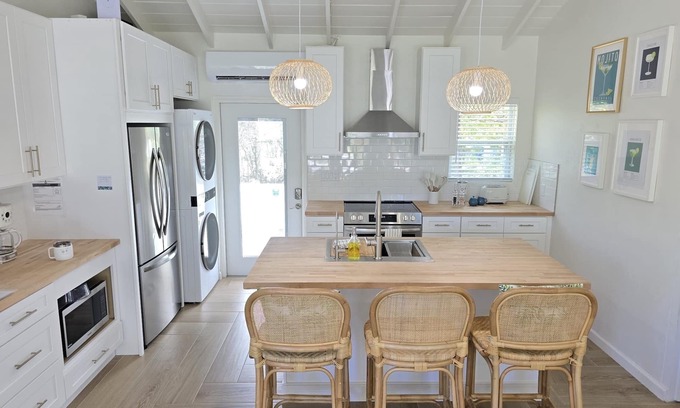 Great Exuma Villa | NUEVA villa JUSTO EN LA PLAYA de Hoopers Bay con jardines tropicales privados