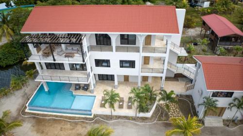 Placencia Villa | NEW 3 Story Waterfront 4Bedroom Villa with Amazing Sunset Mountain Views