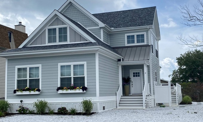 Fenwick Island Casa | New 5 bedroom & 6 bathroom waterfront home on canal with pool close to beach!