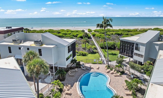 Sanibel Casa | New Cyprina Unit #2 – a fully renovated, Serena & Lily–inspired townhome on Sanibel’s sought-after East End. This luxury beach retreat seamlessly blends coastal elegance with modern comfort, offering breathtaking direct water views from every room.