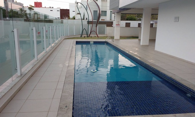 Lagoa Pequena Apartamento | Apartamento nuevo, 2 habitaciones, amueblado con piscina en la playa del Nuevo Campeche / Floripa
