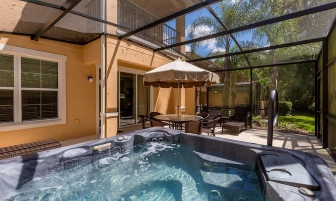 Kissimmee Casa | NEW! Handicap Accessible Regal Oaks Townhome with private spa and Conservation view