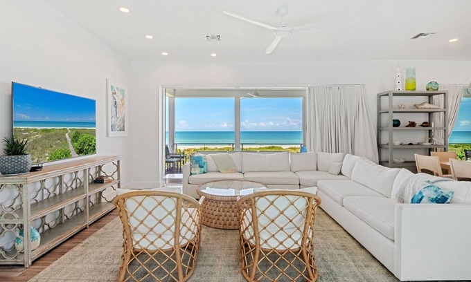 Captiva Casa | Captiva, Florida, Estados Unidos 33924. Direct Beach Front Estate con piscina / jacuzzi / juegos y más
