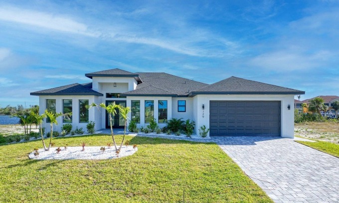 Burnt Store Villa | New listing - Amazing new 3beds/3baths Gulf access villa w. heated pool and outdoor kitchen!