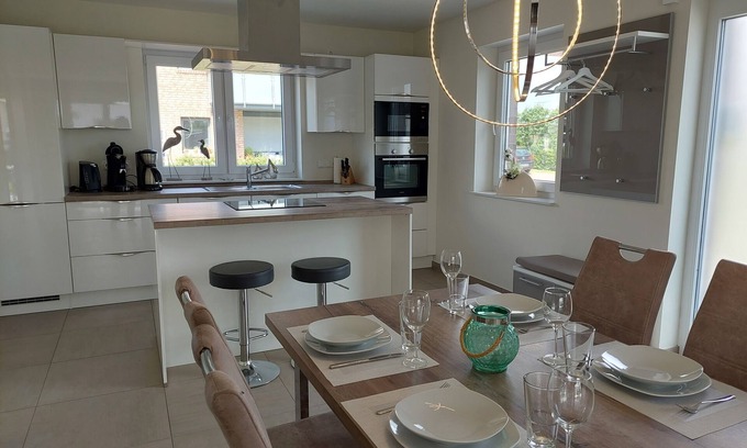 Nordseebad Burhave Apartamento | NEW! modern, high-quality, central apartment, with sauna, garden, wallbox in Burhave