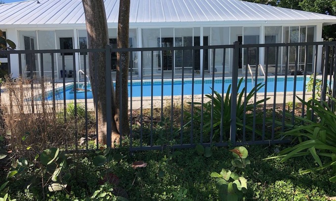 The Dunes Casa | Newly renovated 2024. Located on golf course with a lake view and pool.