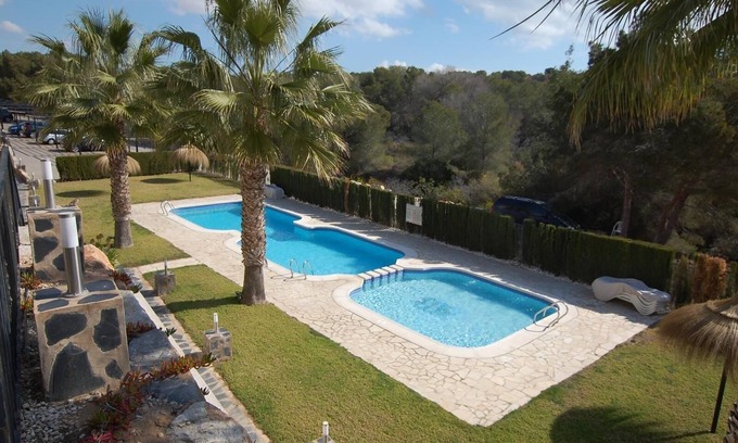 Orihuela Costa Apartamento | Bonito apartamento en una zona maravillosa con piscina compartida y Wi-Fi