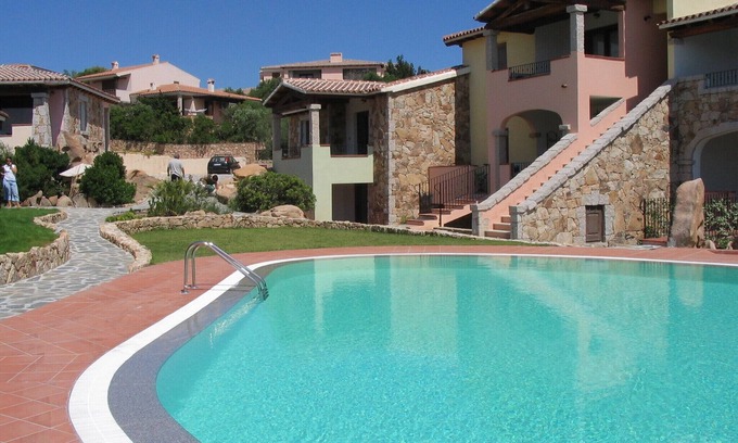 Monte Petrosu Apartamento | San Teodoro:Precioso apartamento con azotea en elegante residencia con piscina