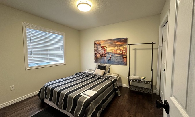 Grand River South Casa | Nice home with cozy living room, large backyard, bedroom and bathroom.