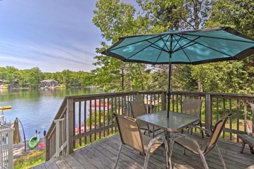 Lake George Casa | Northern Michigan Lake House with Boat Dock and Kayaks