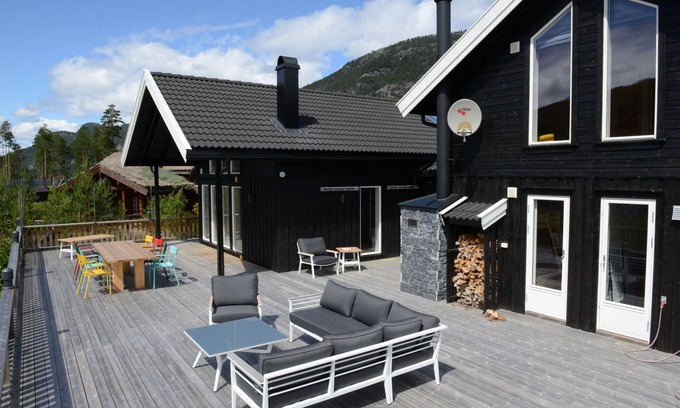 Kviteseid Villa | Casa de vacaciones de lujo en medio de la naturaleza y directamente en el lago Vravatn