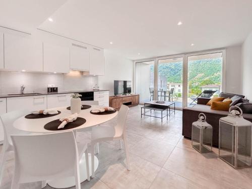 Melano Apartamento | Nuovo e moderno appartamento 2 locali vicino al lago