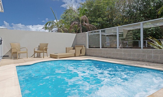 Salamander Bay Apartamento | 516 'Oaks Pacific Blue', 265 Sandy Point Road, piscina privada, aire acondicionado, WIFI