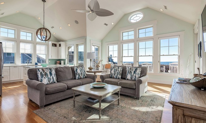 South Beach Casa | Ocean front 5 bedroom reverse floor plan home! Access to both clubs and 2 new golf carts