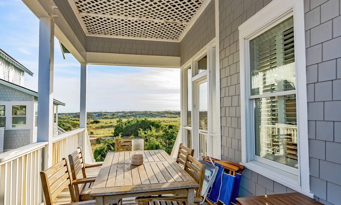 South Beach Casa | Ocean front duplex with master balcony overlooking the beach; newer six passenger golf cart
