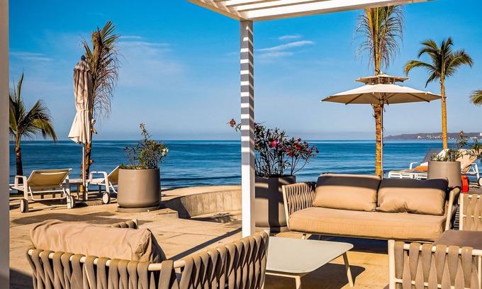 Flamingos Condominio | Ocean-view 5th-floor condo with 4 pools, sauna, steam room, huge balcony, & gym