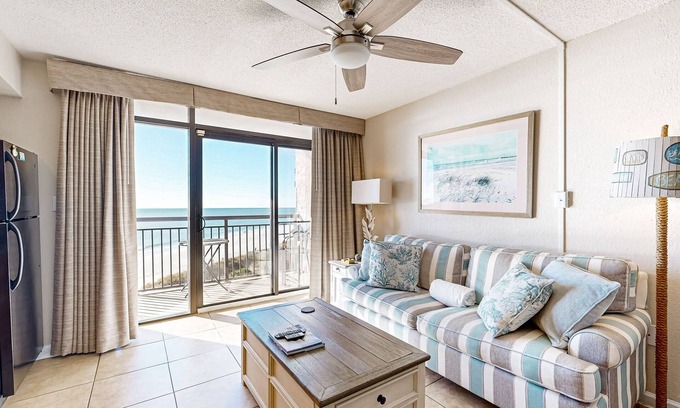 Windy Hill Condominio | Oceanfront condo with outdoor pool, hot tub, private balcony & central AC