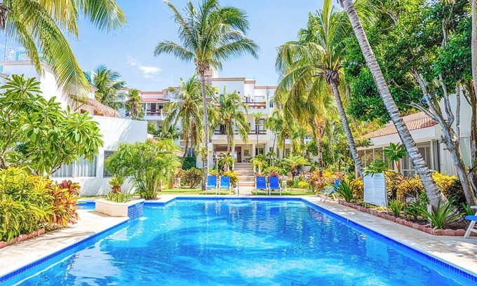 Akumal Condominio | Oceanfront Living with Direct Beach Access and Lush Poolside Gardens!