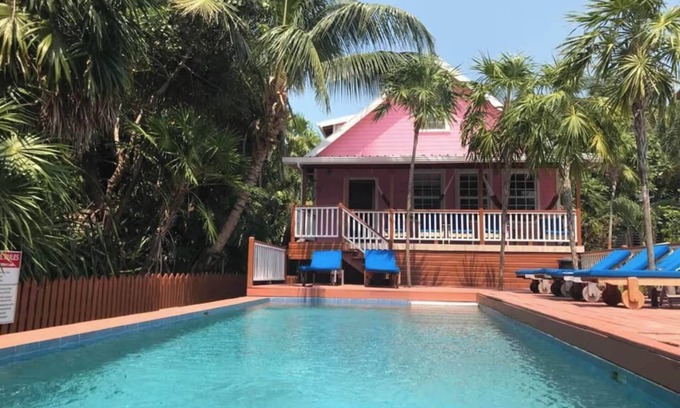 Caye Caulker Apartamento | A pasos de la playa 3 habitaciones, 2 baños, casa con muelle de piscina privada, playa y aire acondicionado
