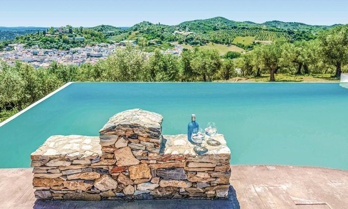 Constantina Casa | On a small hill in the mountains of Constantina, you will find this lovely vacation finca with a spe