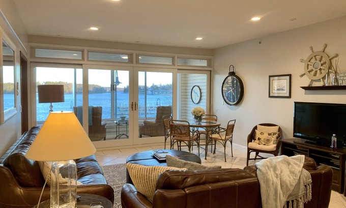 Charlevoix Condominio | On Round Lk in the Heart of Charlevoix w Garage. Walking Distance to Everything.