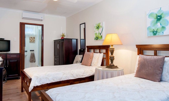 Durban North Cama Y Desayuno | Habitación Oriole en The Brother's Guest, Durban North