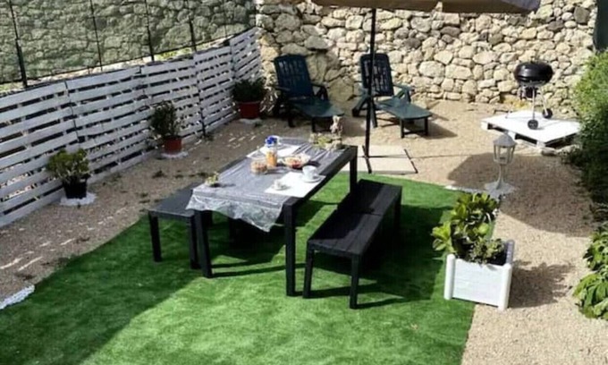 Nulvi Apartamento | Osiris house with private garden and barbecue