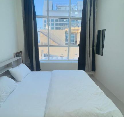Ajman Casa | P3) Fantastic Seaview Room with shared bath inside 3bedroom apartment