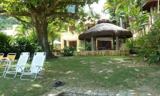 Toque Toque Casa | Paradise Los pies en la arena frente del agua con 16 camas