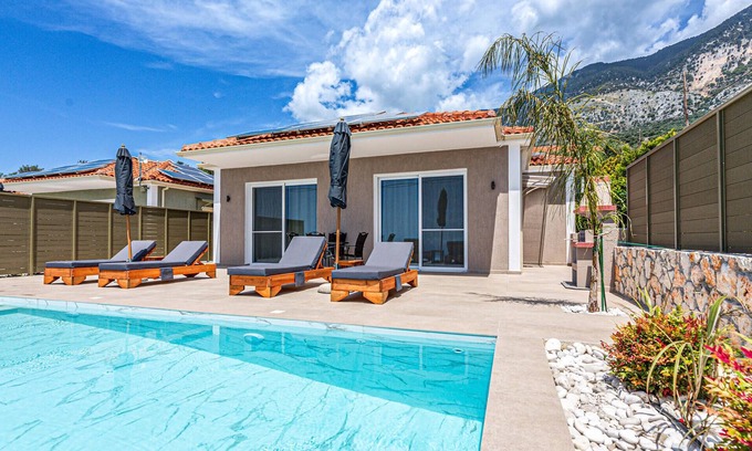 Vlachata Casa | Part of a collection of apartments and villas, Villa George is in an enviable location, sitting abov