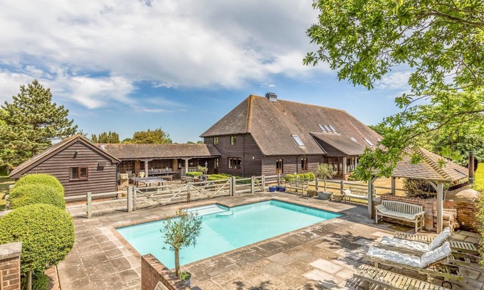 Sidlesham Casa | Pass the Keys | Large Converted Barn With Pool, Gym and Gardens
