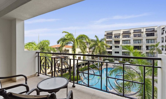 Washington Condominio | Elegancia tropical, condominio acogedor con vistas a la piscina con encanto