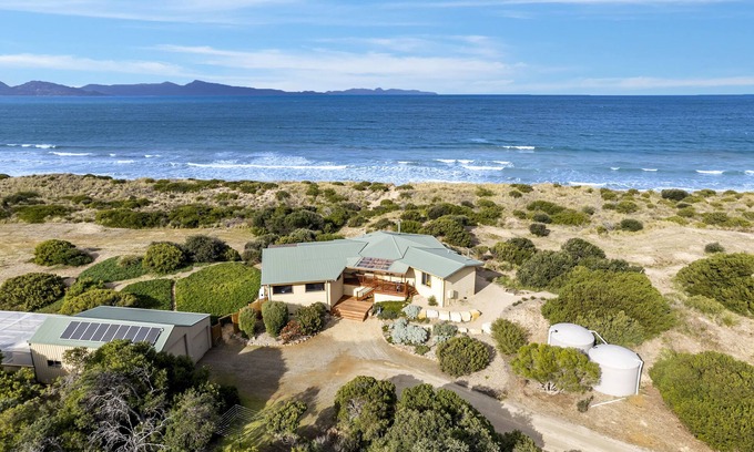 Dolphin Sands Casa | Peace & Plenty - escondite romántico frente al mar