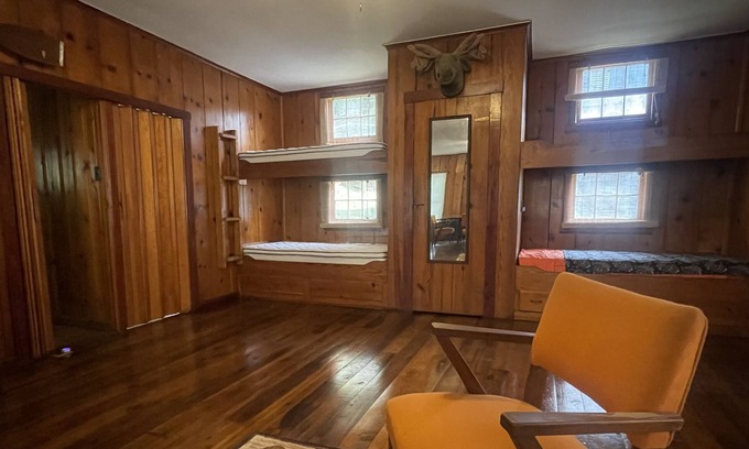Cross Lanes Cabina | Peaceful fishin’ camp on a lake, bring your dog, and fishing pole.