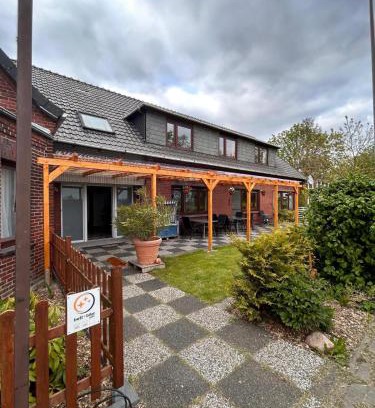 Butjadingen Casa | Pension zum Leuchtfeuer