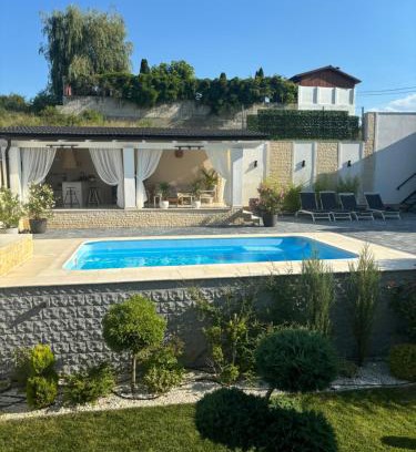 Archia Casa | Pensiunea Coralia