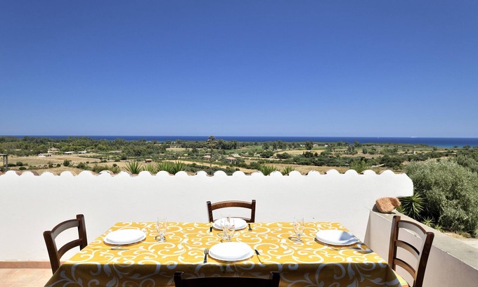 Cardedu Casa | Casa de vacaciones que admite mascotas Vista Mare con vistas al mar, jardín y Wi-Fi